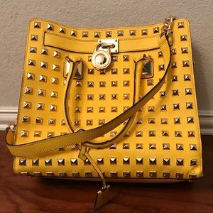 Yellow studded Michael kors bag